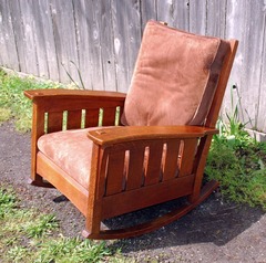 Large L. & J. G. Stickley Bow Arm Rocker with slats.